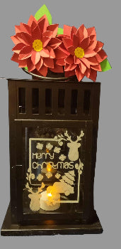 Decorative lantern with floral design and 'Merry Christmas' text
