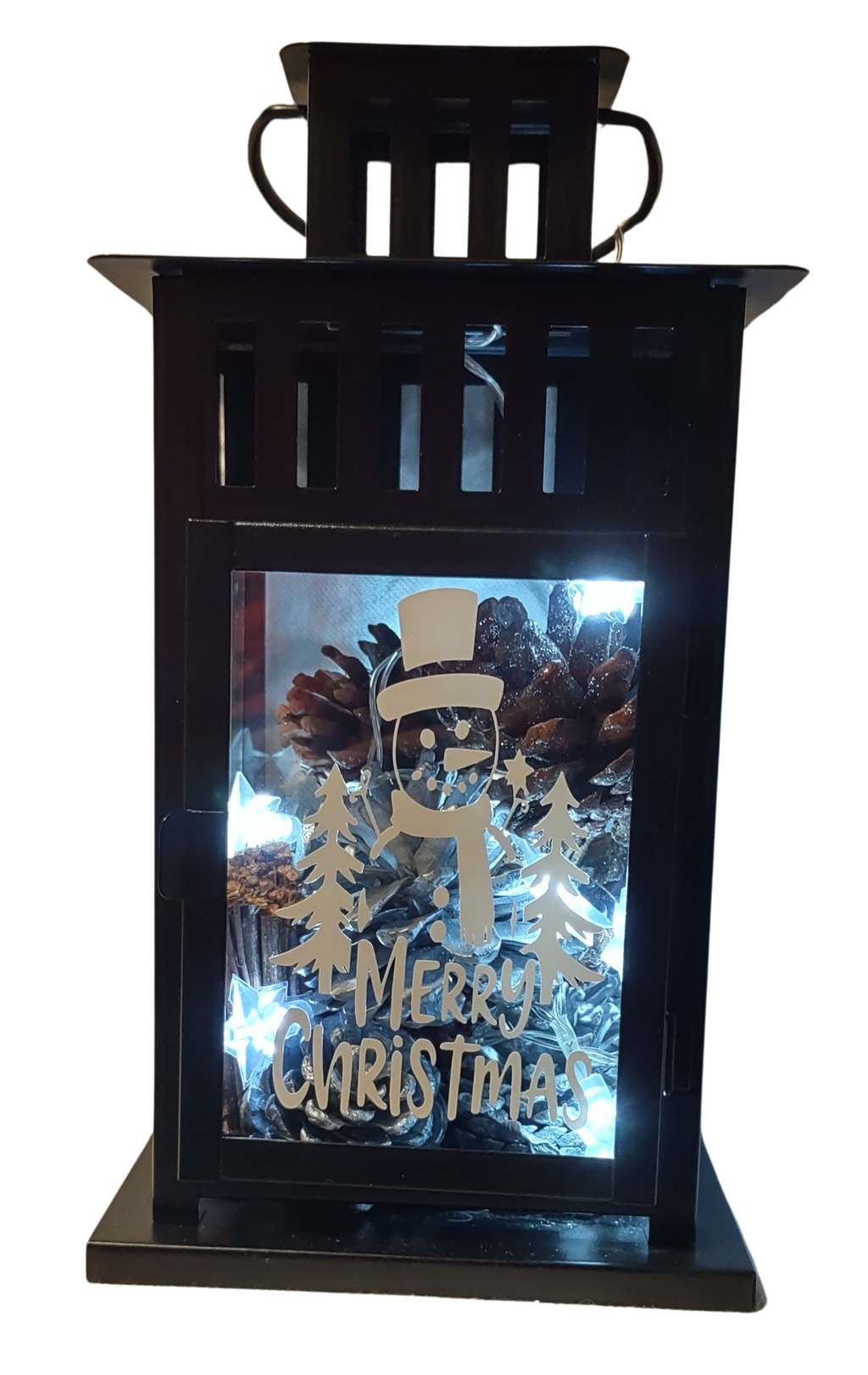 Decorative Christmas lantern with LED lights and 'Merry Christmas' text.
