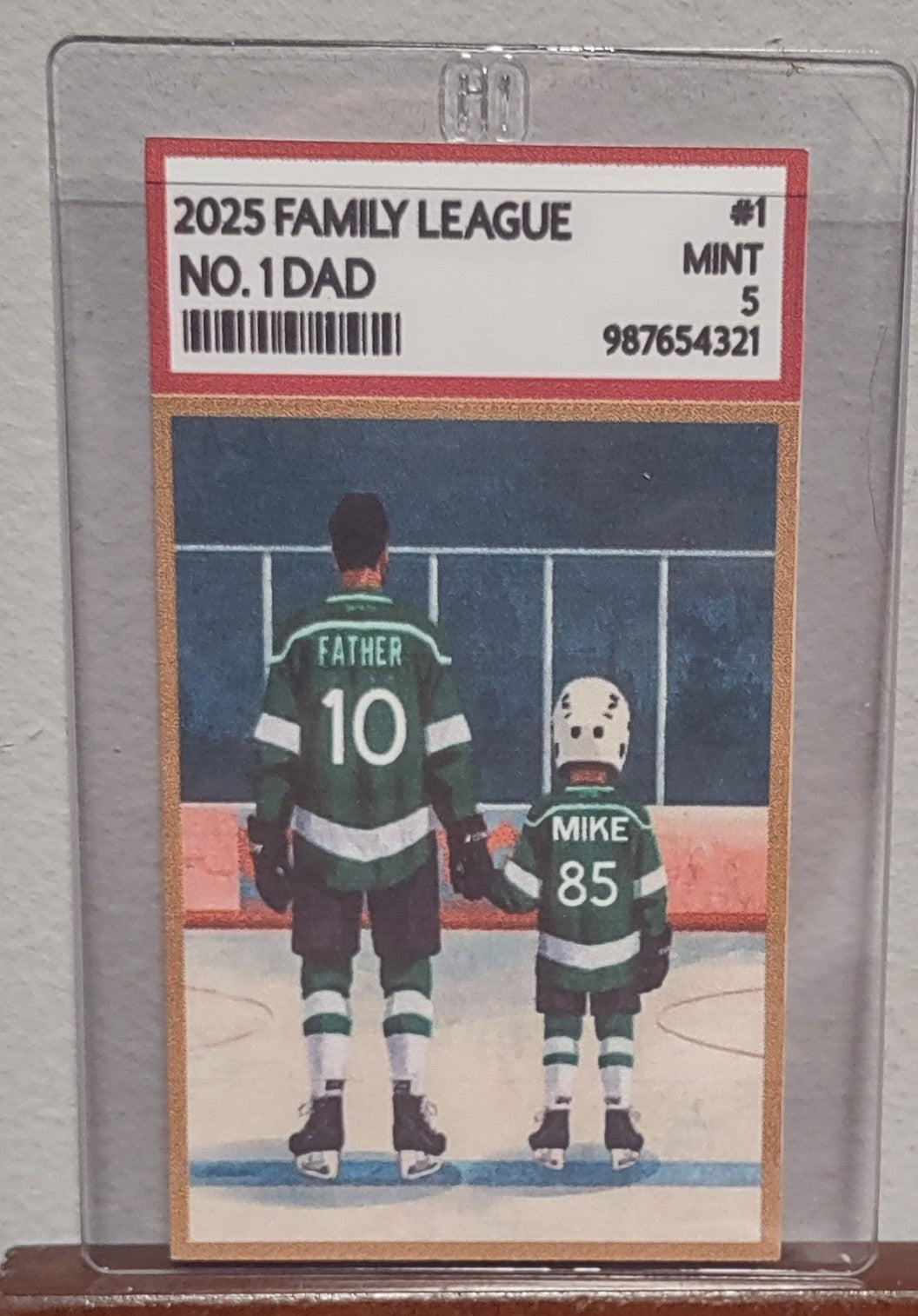 Hockey trading card featuring a father and son on an ice rink with '2025 Family League' branding.