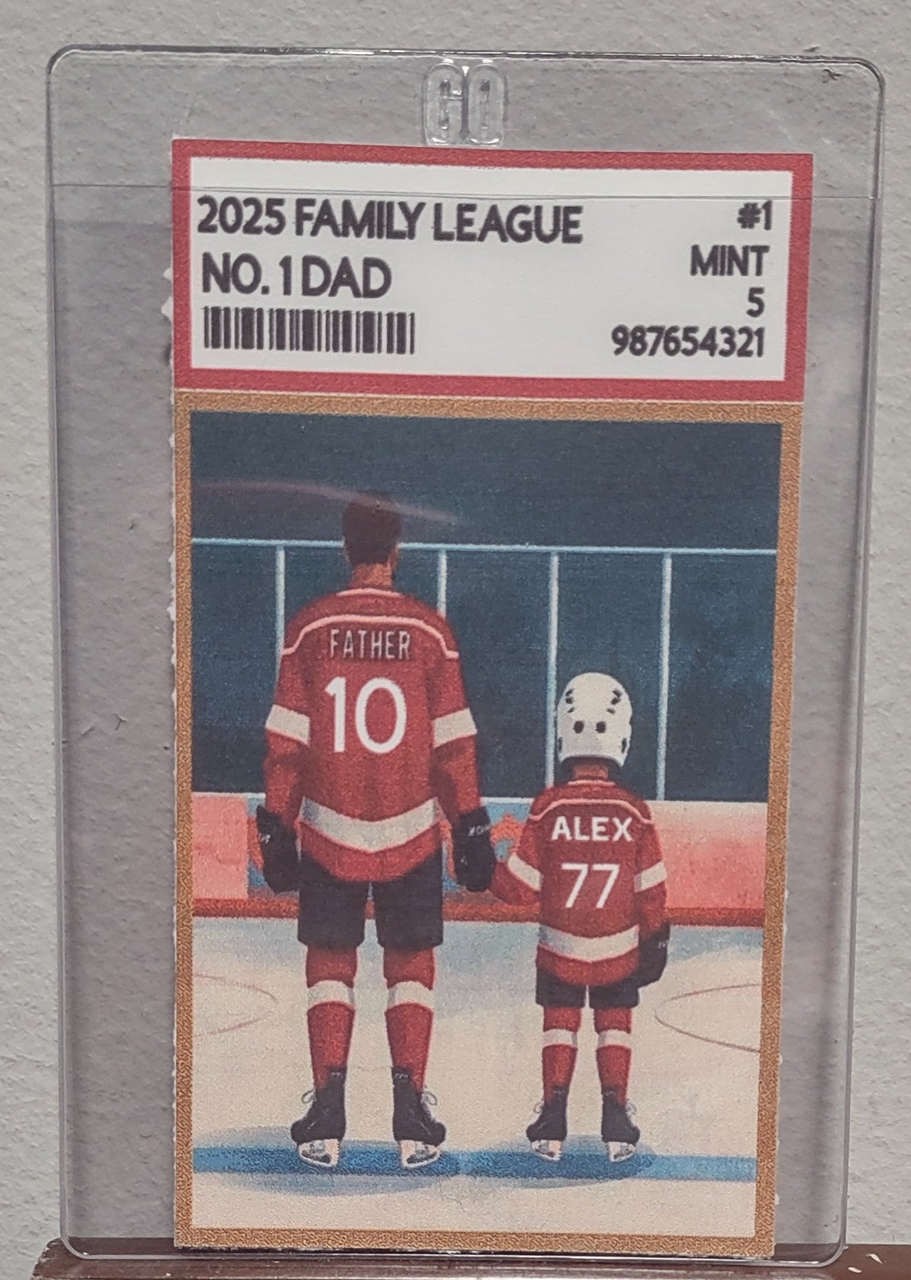 Trading card featuring a father and son hockey players on an ice rink, with '2025 Family League' branding.